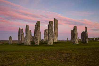Callanish Standing Stones viewed under the red glow of sunset